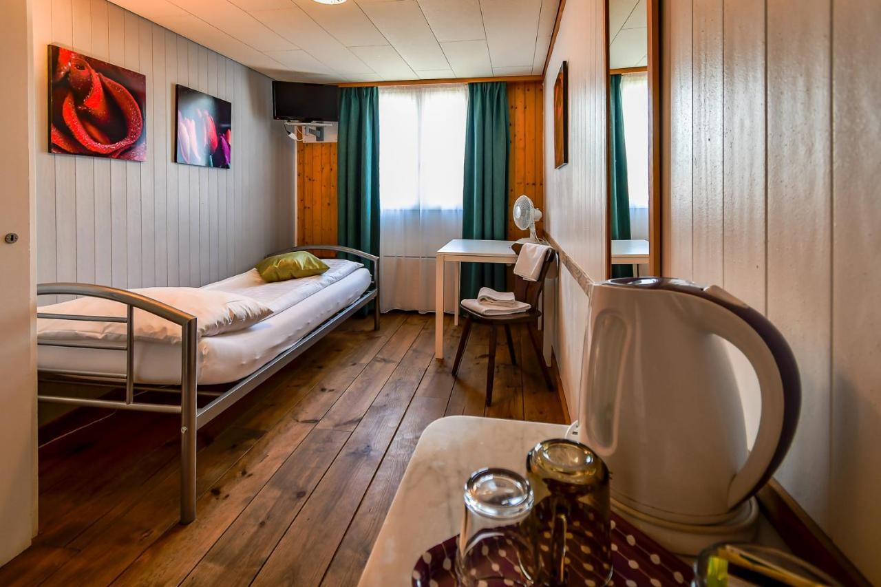 Hotel Tell And Apartments Unterseen Extérieur photo