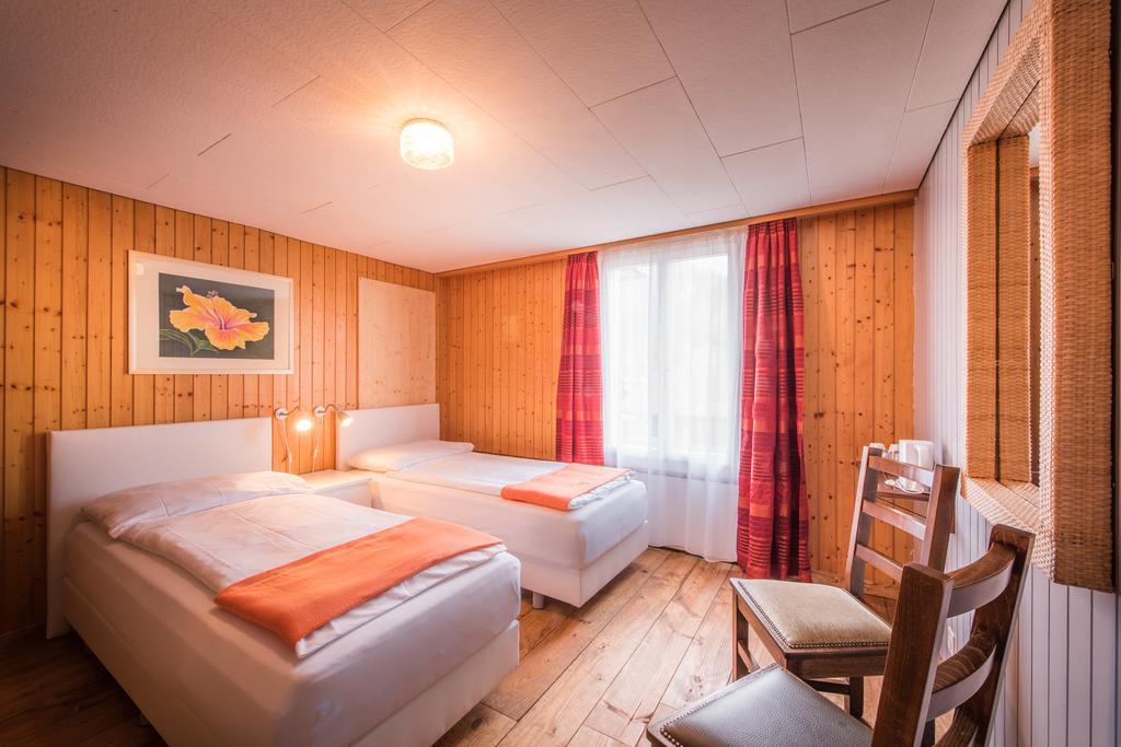 Hotel Tell And Apartments Unterseen Chambre photo
